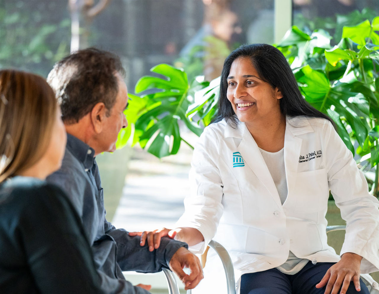 Manisha Patel, MD with a patient