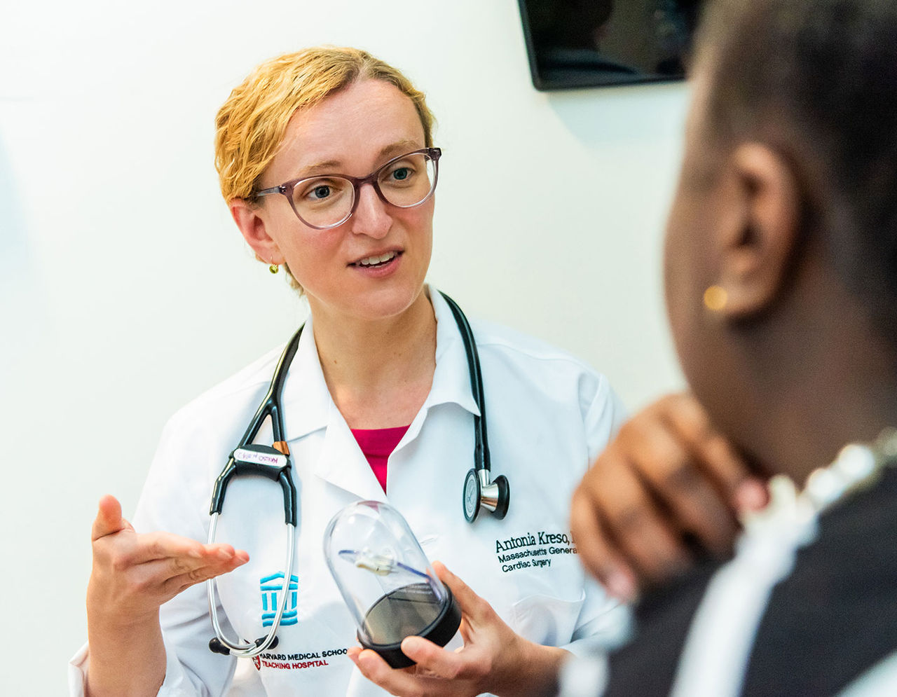 cardiac surgeron talking to patient