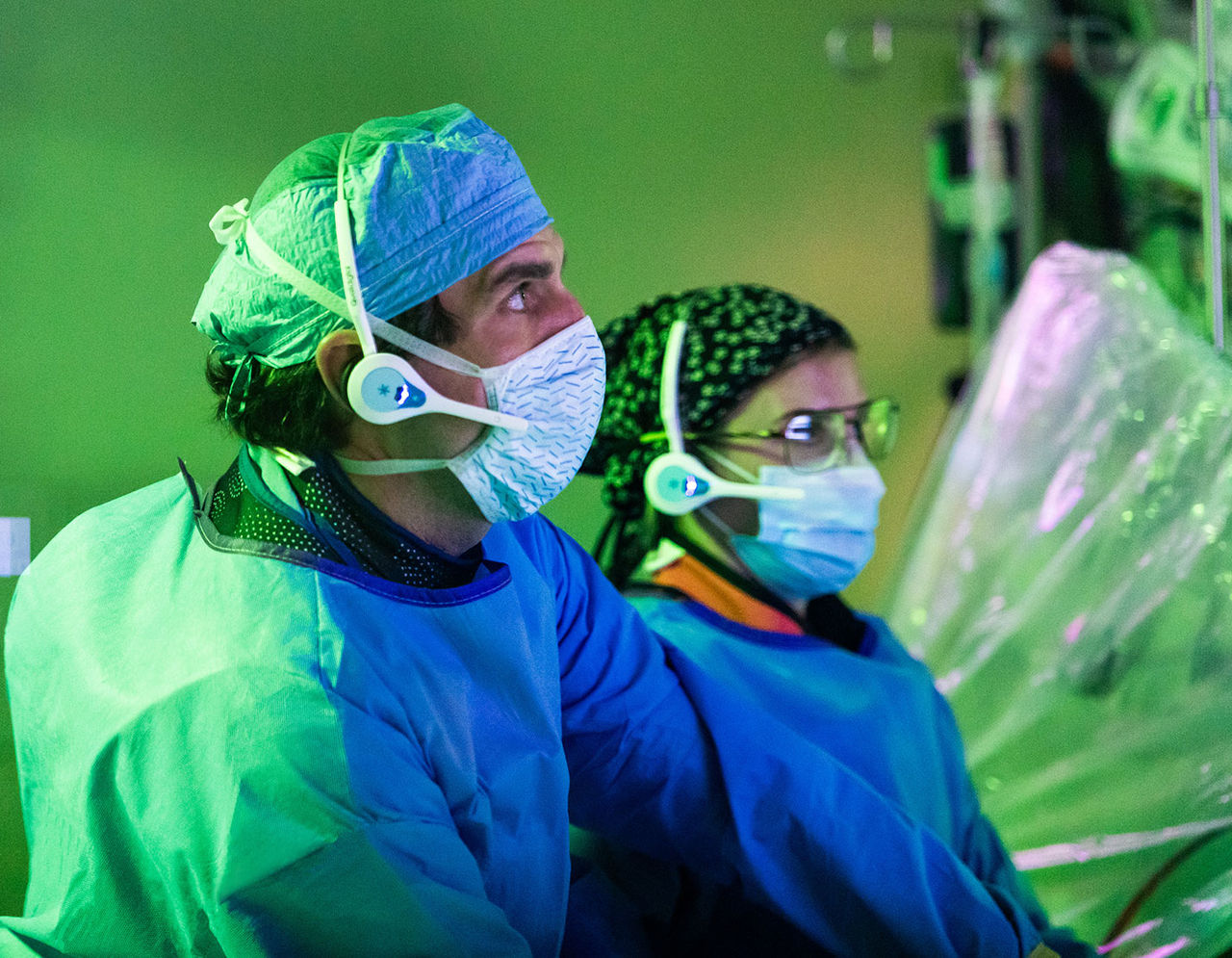 heart providers peforming electrophysiology studies on patient in lab