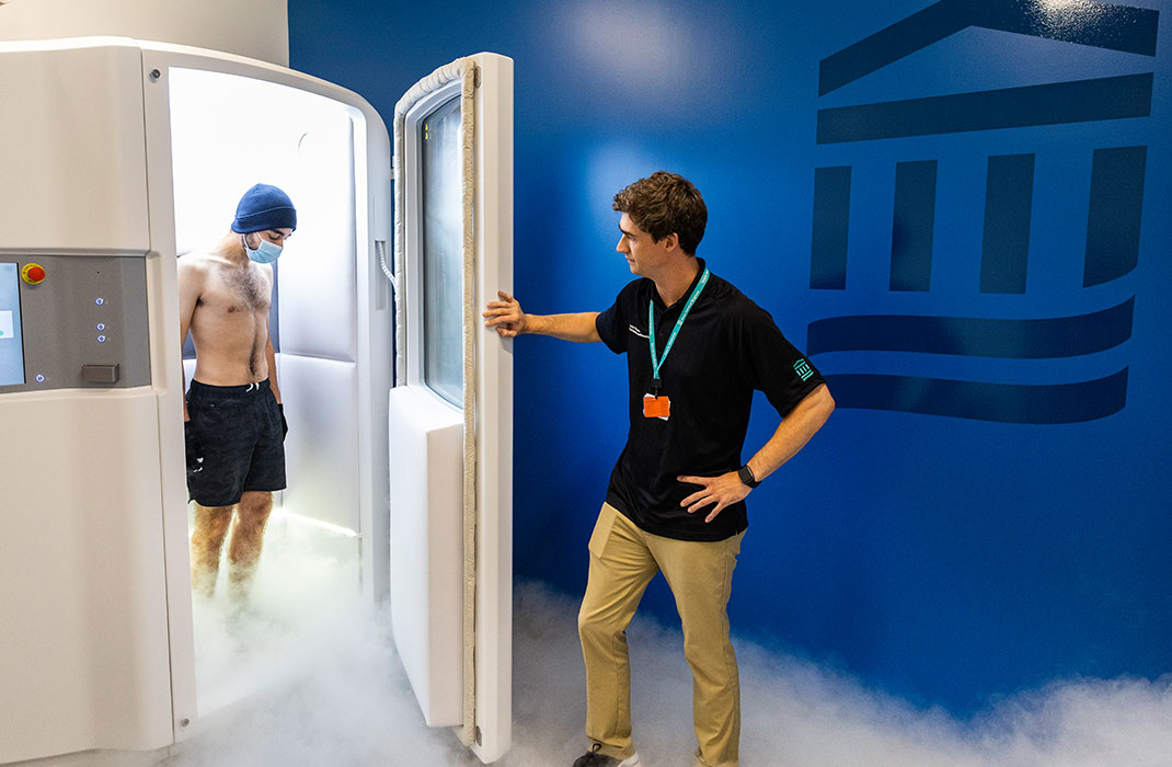 man inside cryotherapy chamber