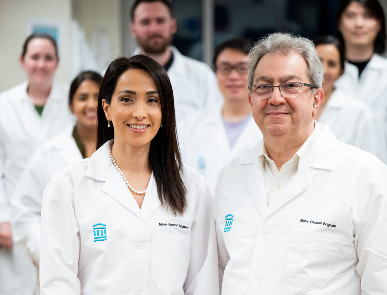 Natalie Artzi, PhD and Roger J. Hajjar, MD with team members