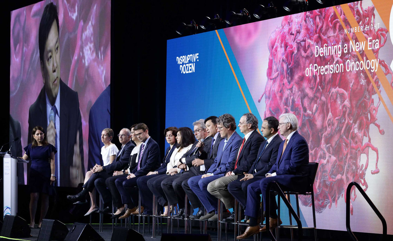 Panelists on stage announce the Disruptive Dozen at the World Medical Innovation Forum.