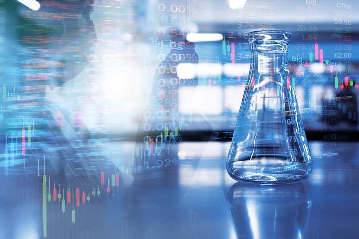 Single glass flask with double exposure scientist or researcher holding tube in chemistry blue laboratory with stock market information background