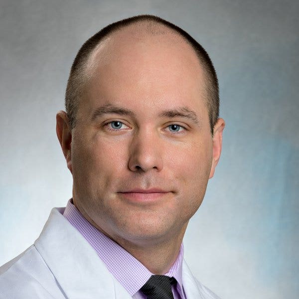 Alan J Cubre, MD