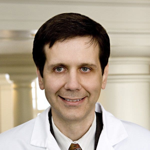 John B Piecyk, MD