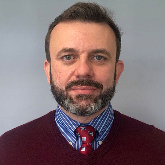 Vladyslav Revin, MD