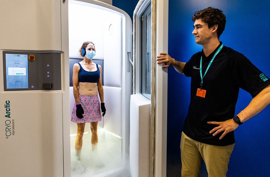 woman standing in cryo chamber 
